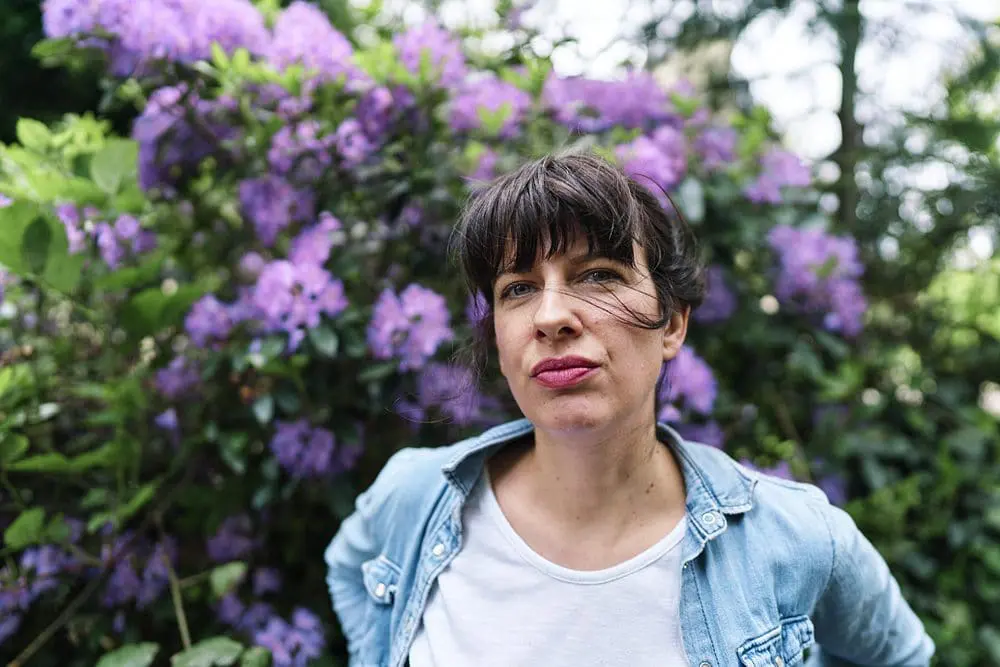 Copywriter looking confident in headshot — personal brand photography London