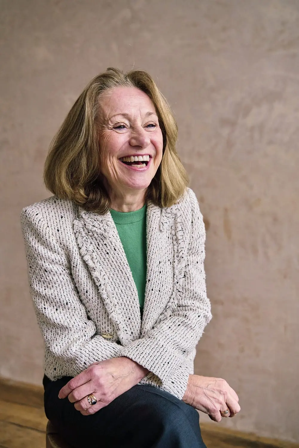 Personal brand photography headshot of woman smiling in woodland — brand photographer London