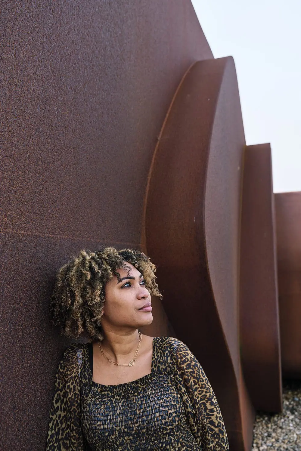 Natural personal brand photography headshot of woman looking away — storytelling brand photographer London