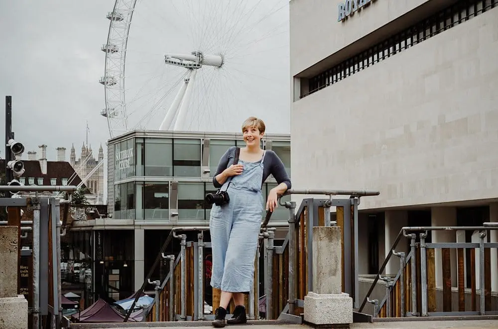 Saskia Albers, documentary photographer and filmmaker, with camera at the London Eye