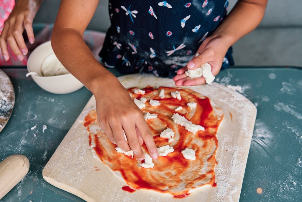 MAking pizza during a family photoshoot in Hayes Bromley South-East London