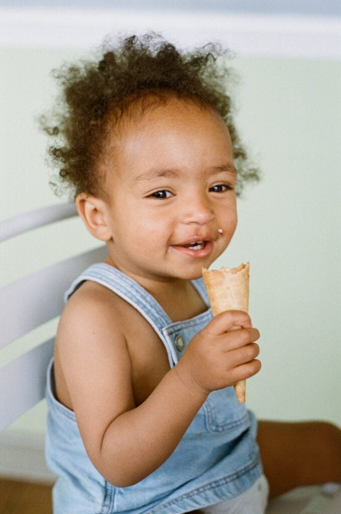 print credit will let you print your family photos like this girl eating her ice cream.