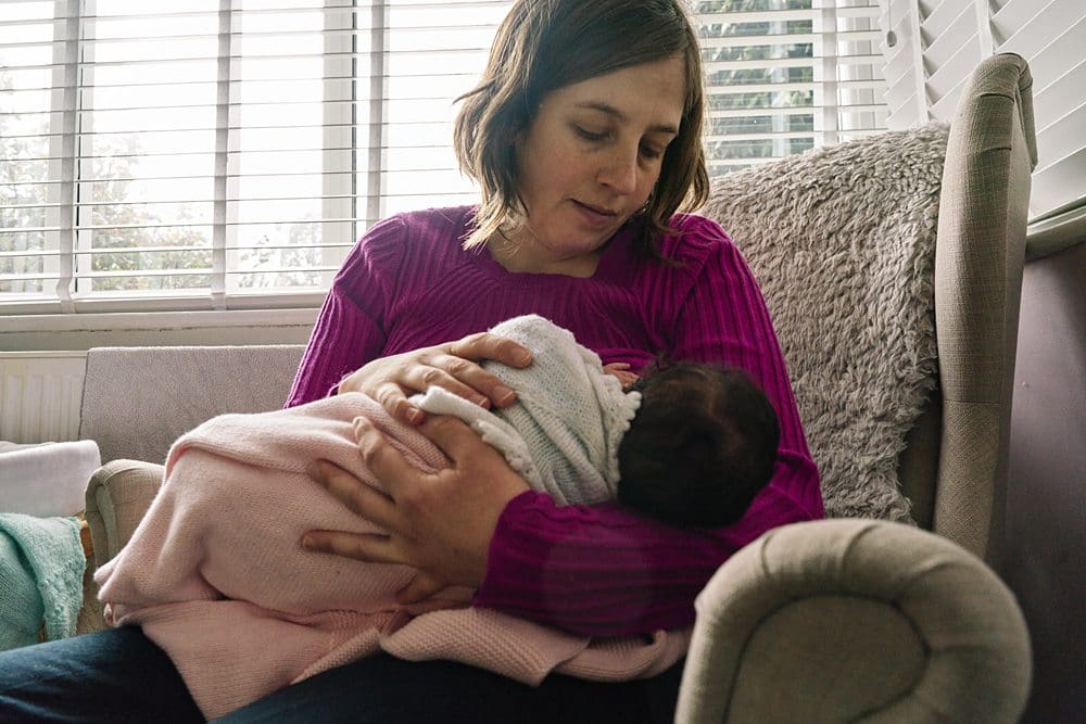 Selfie of Saskia Albers breastfeeding her baby — an intimate, honest self-portrait