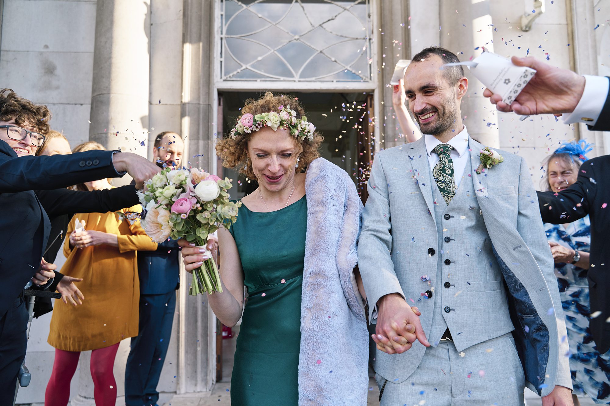 Joyful confetti shower as couple exits wedding ceremony in Beckenham, South East London