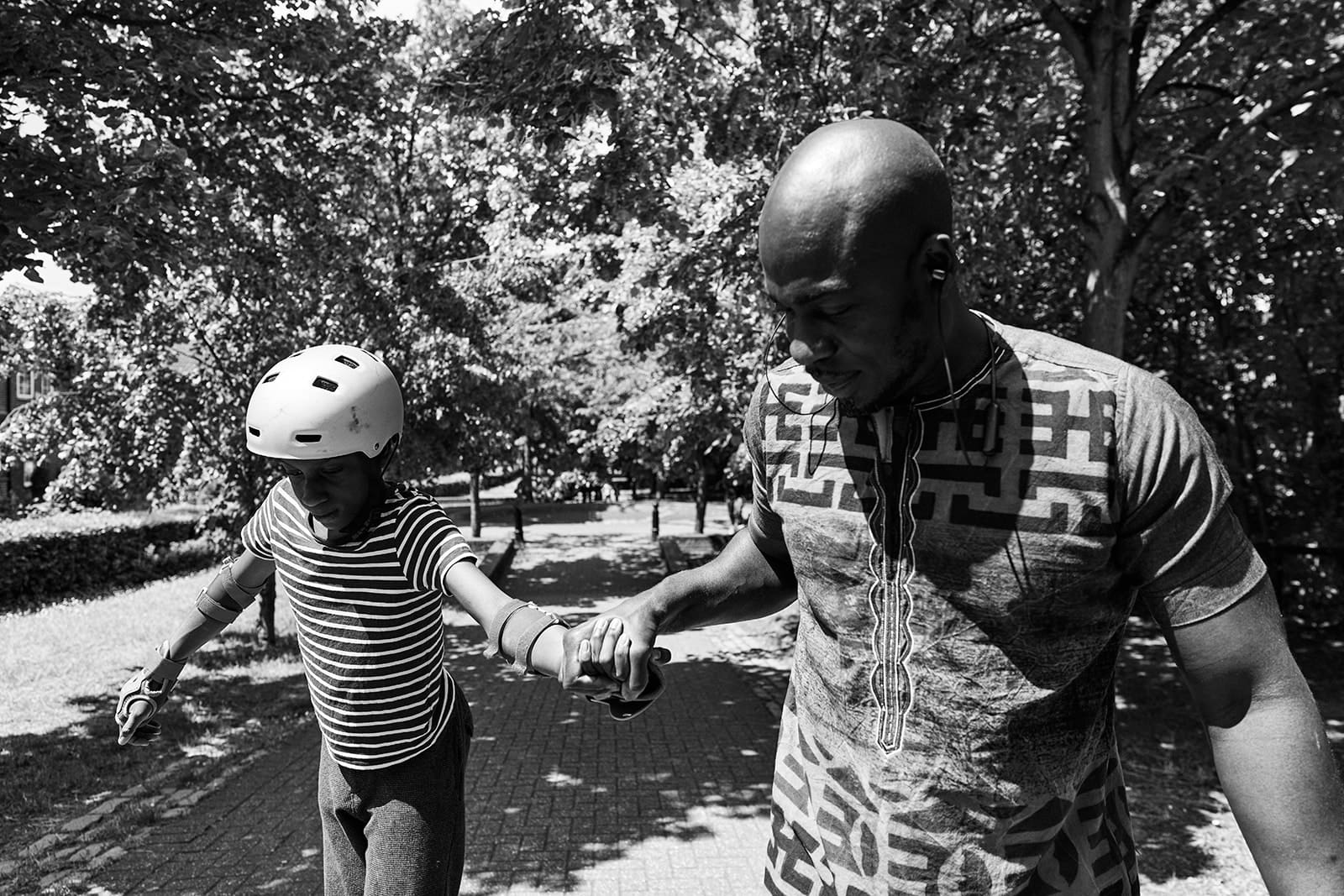 Family having fun outdoors during an autism-friendly family photography session in London.