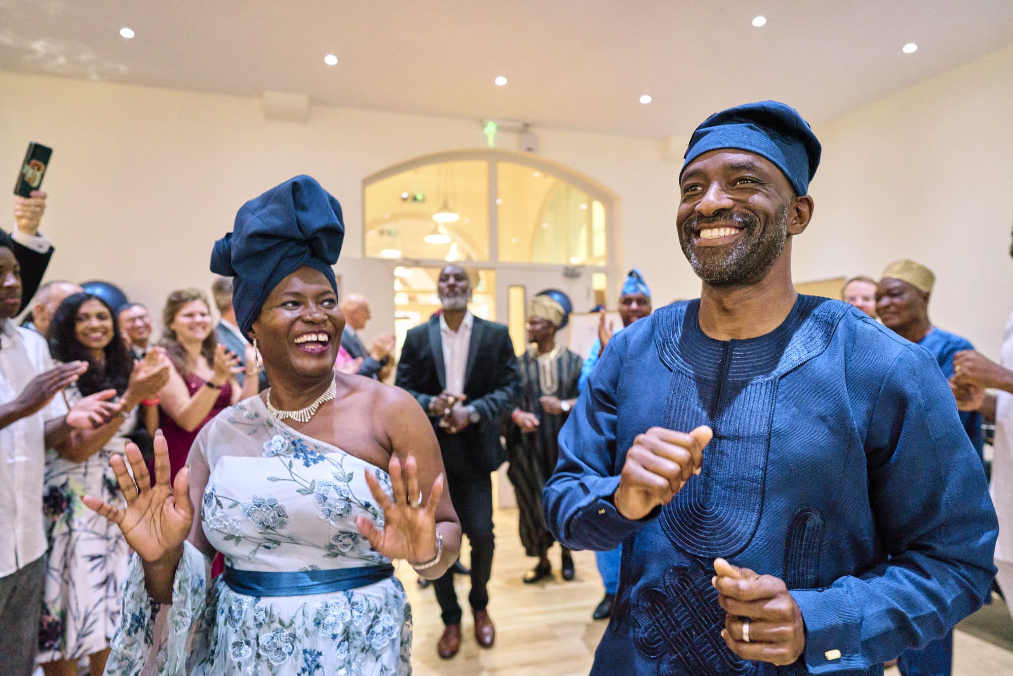 Documentary family event photography in London capturing candid celebration moments like the entry dancing into your birthday celebration.